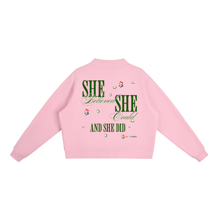 Back view of a pink Essential Fleece Mock-Neck Crew Sweatshirt with motivational text design.