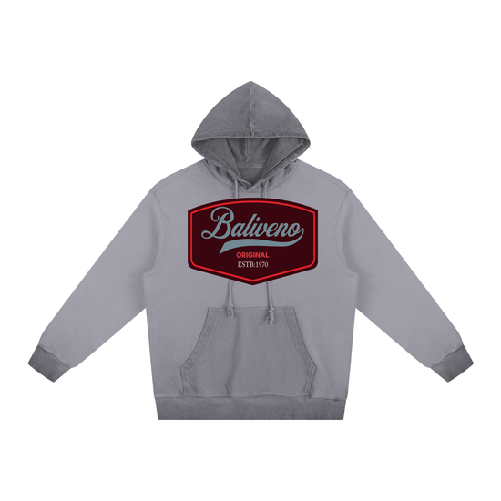 The ODMPOD Ombre Vintage Stone Washed Colorpointed Hoodie is a gray unisex hoodie with a front pocket and a large dark red chest patch reading “Baliveno ORIGINAL EST. 1970” in white, giving it vintage appeal.