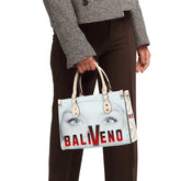 Baliveno Luxury leather HandbagBaliveno Luxury leather HandbagCrafted with quality vegan PU leather, this printed tote boasts a structured silhouette with dual top handles for a balanced, hands-free carry. A top zipper closure [Bal]