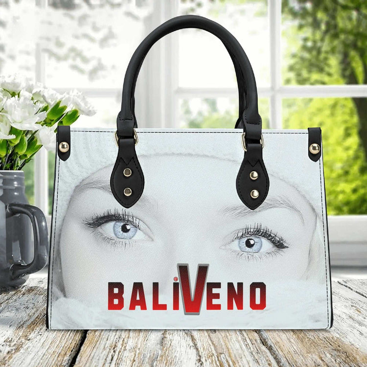 Baliveno Luxury leather HandbagBaliveno Luxury leather HandbagCrafted with quality vegan PU leather, this printed tote boasts a structured silhouette with dual top handles for a balanced, hands-free carry. A top zipper closure [Bal]