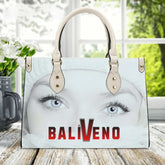 Baliveno Luxury leather HandbagBaliveno Luxury leather HandbagCrafted with quality vegan PU leather, this printed tote boasts a structured silhouette with dual top handles for a balanced, hands-free carry. A top zipper closure [Bal]