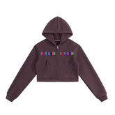 Essential Cropped Zip-Up Hoodie in dark purple with colorful lettering on chest and a casual loose fit.