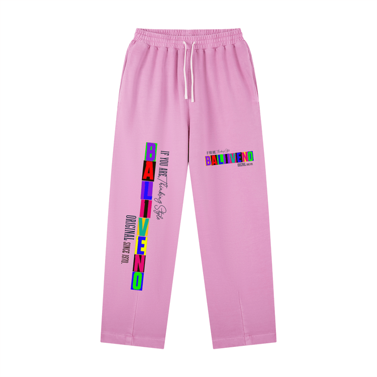 Vintage Washed Drawstring Sweatpants in pink with bold print and drawstring waistband.