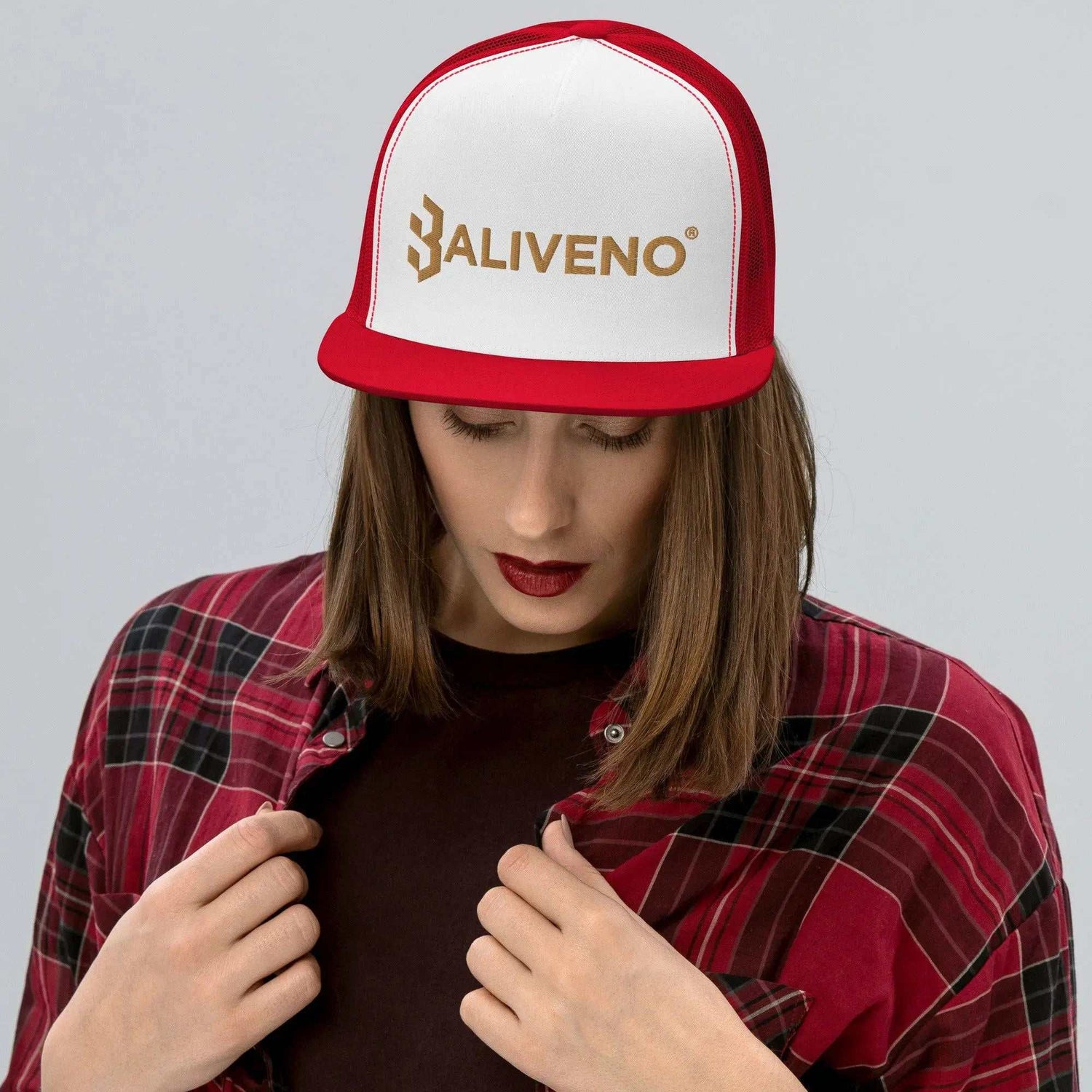 Classic Trucker CapTrucker CapElevate your headwear game with our Classic Trucker Cap, boasting timeless style and a cool fabric blend for that perfect finishing touch to any outfit.
Crafted from[Bal]