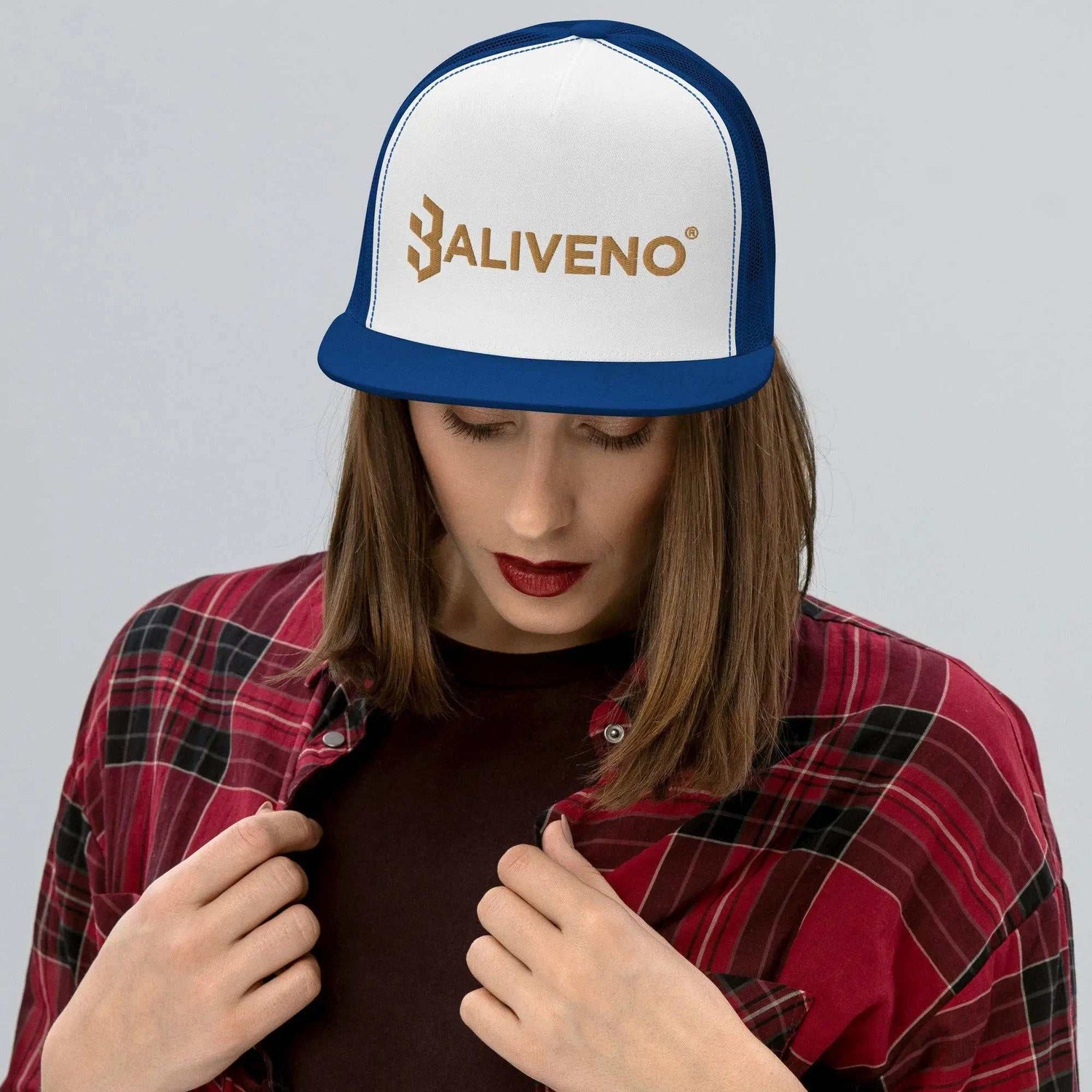 Classic Trucker CapTrucker CapElevate your headwear game with our Classic Trucker Cap, boasting timeless style and a cool fabric blend for that perfect finishing touch to any outfit.
Crafted from[Bal]