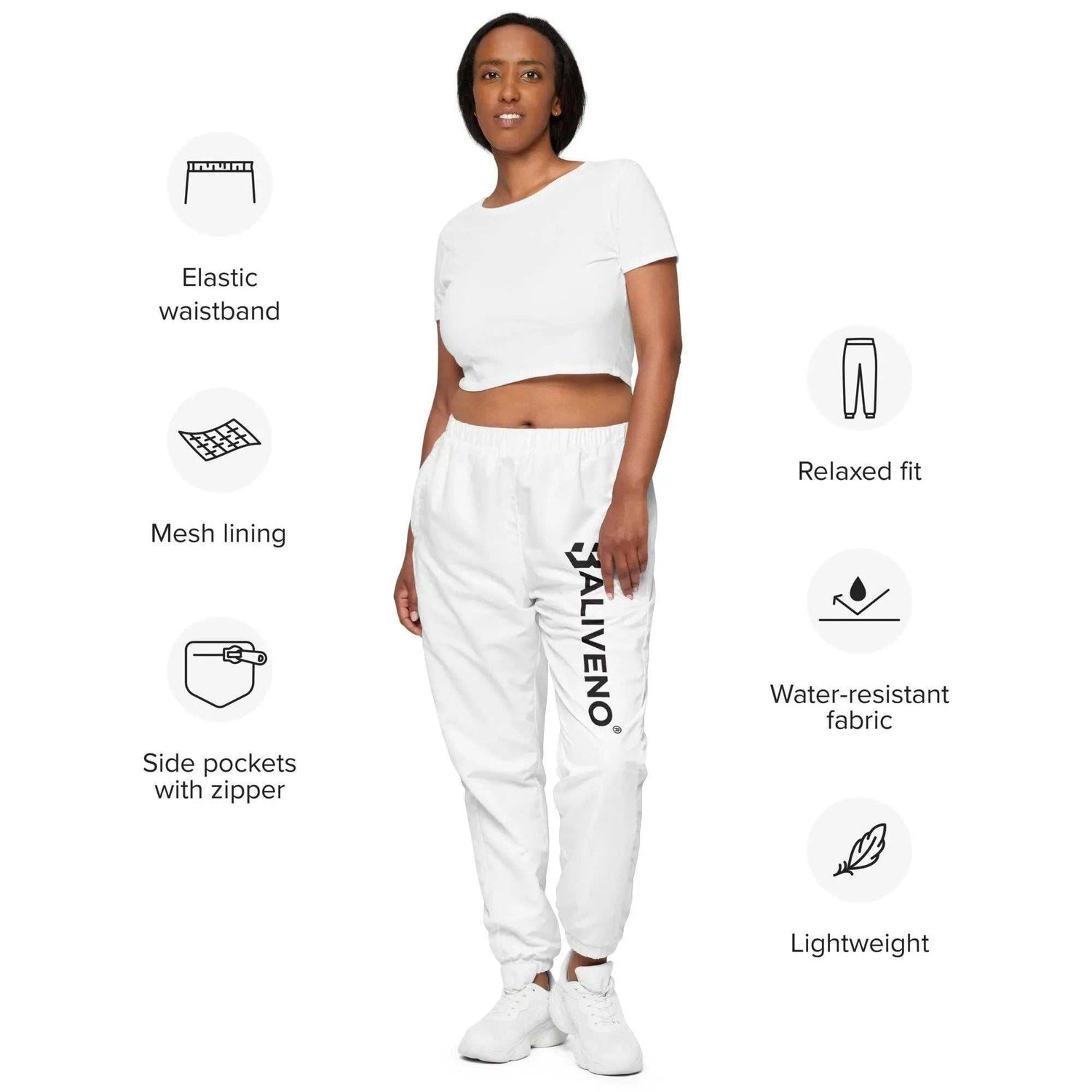 Unisex Track PantsUnisex track pantsIntroducing our Unisex Track Pants, your new essential piece for both workout sessions and streetwear styling. Crafted from 100% polyester, these pants offer a light[Bal]