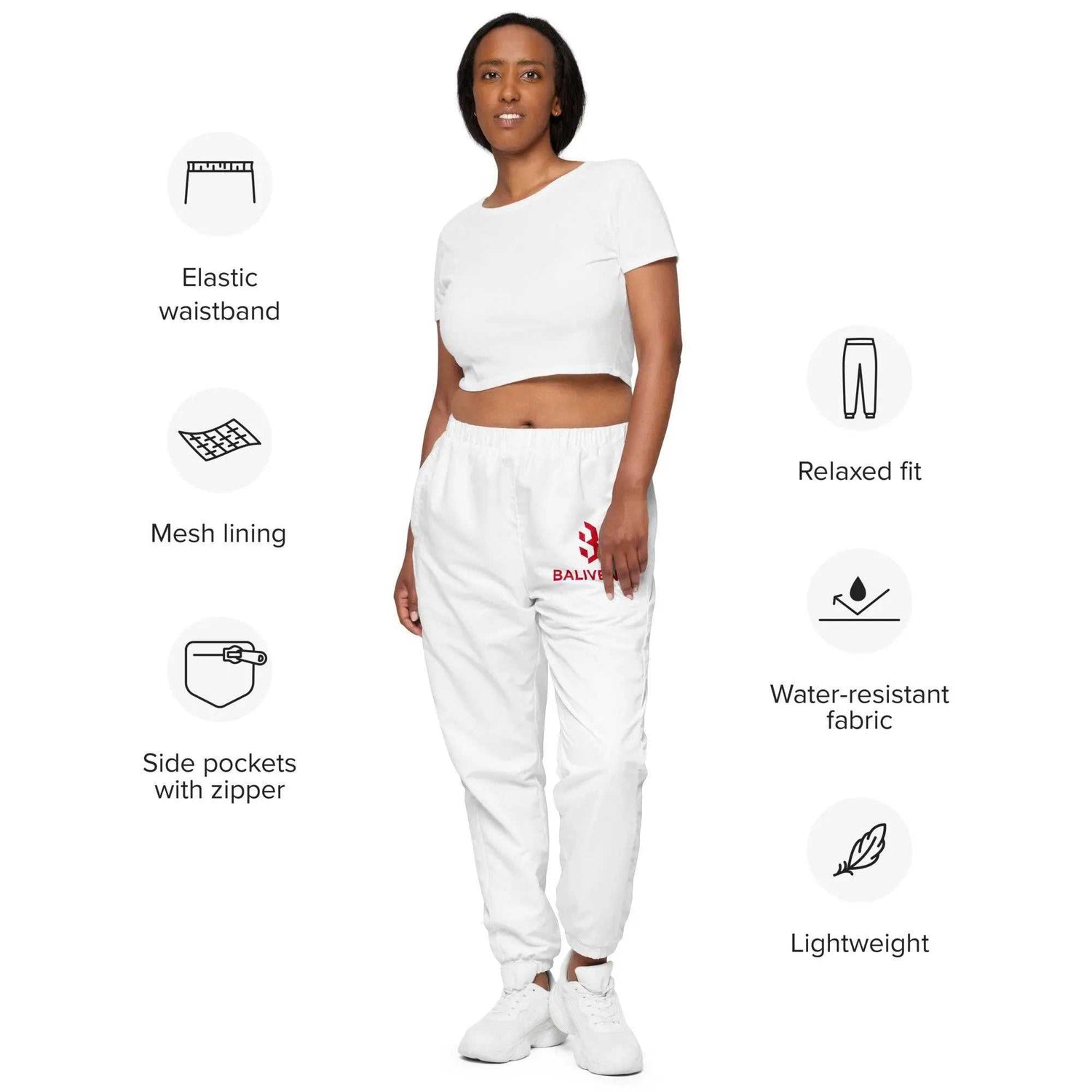 Unisex Track PantsUnisex track pantsIntroducing our Unisex Track Pants, your new essential piece for both workout sessions and streetwear styling. Crafted from 100% polyester, these pants offer a light[Bal]