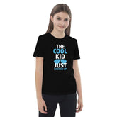 The Cool KidThe Cool Kid Just Showed Up T-shirtIntroducing "The Cool Kid Just Showed Up" T-shirt – the perfect blend of style, comfort, and sustainability for your little trendsetter! Crafted from 100% organic ri[Bal]