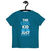 The Cool KidThe Cool Kid Just Showed Up T-shirtIntroducing "The Cool Kid Just Showed Up" T-shirt – the perfect blend of style, comfort, and sustainability for your little trendsetter! Crafted from 100% organic ri[Bal]