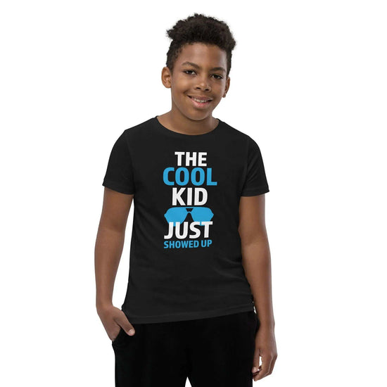 The Cool KidThe Cool Kid Just Showed Up T-ShirtIntroducing "The Cool Kid Just Showed Up" T-shirt – the perfect blend of style, comfort, and sustainability for your little trendsetter! Crafted from 100% organic ri[Bal]
