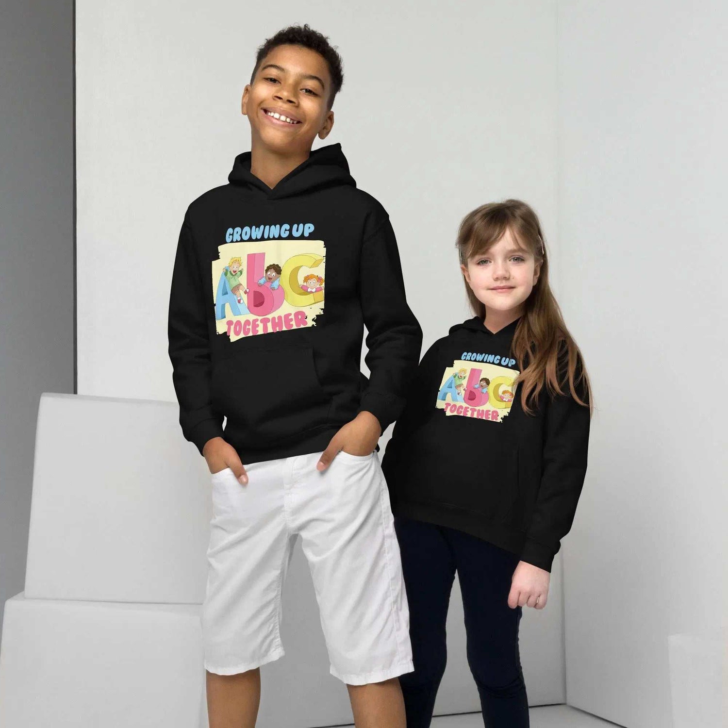 Growing Up Together HoodieGrowing Up Together HoodieIntroducing our Growing Up Together Hoodie – the epitome of snugness and style for your little one.
Designed to keep your child cozy and chic, this kids&