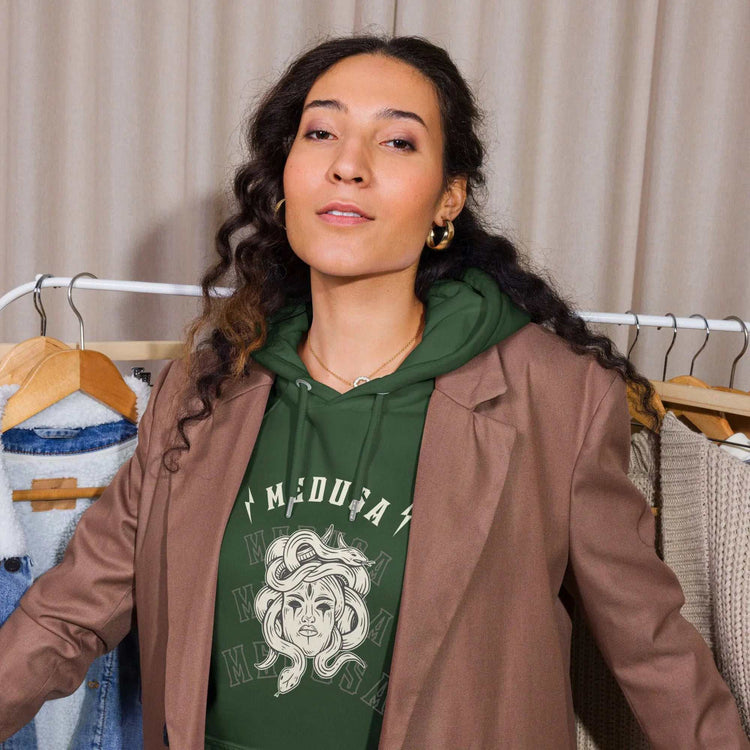 Medusa Baliveno HoodieMedusa Baliveno HoodieEmbrace style without sacrificing comfort with our Medusa Baliveno Hoodie. Crafted for those who appreciate both fashion and coziness, this super-soft unisex eco rag[Bal]