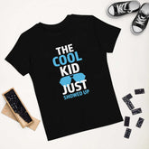 Cool Kid JustThe Cool Kid Just Showed Up T-shirtIntroducing "The Cool Kid Just Showed Up" T-shirt – the perfect blend of style, comfort, and sustainability for your little trendsetter! Crafted from 100% organic ri[Bal]