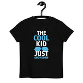 The Cool KidThe Cool Kid Just Showed Up T-shirtIntroducing "The Cool Kid Just Showed Up" T-shirt – the perfect blend of style, comfort, and sustainability for your little trendsetter! Crafted from 100% organic ri[Bal]
