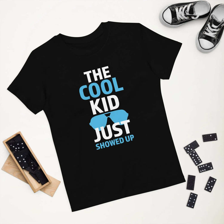 The Cool KidThe Cool Kid Just Showed Up T-shirtIntroducing "The Cool Kid Just Showed Up" T-shirt – the perfect blend of style, comfort, and sustainability for your little trendsetter! Crafted from 100% organic ri[Bal]