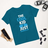 Cool Kid JustThe Cool Kid Just Showed Up T-shirtIntroducing "The Cool Kid Just Showed Up" T-shirt – the perfect blend of style, comfort, and sustainability for your little trendsetter! Crafted from 100% organic ri[Bal]