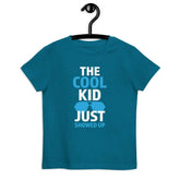 The Cool KidThe Cool Kid Just Showed Up T-shirtIntroducing "The Cool Kid Just Showed Up" T-shirt – the perfect blend of style, comfort, and sustainability for your little trendsetter! Crafted from 100% organic ri[Bal]
