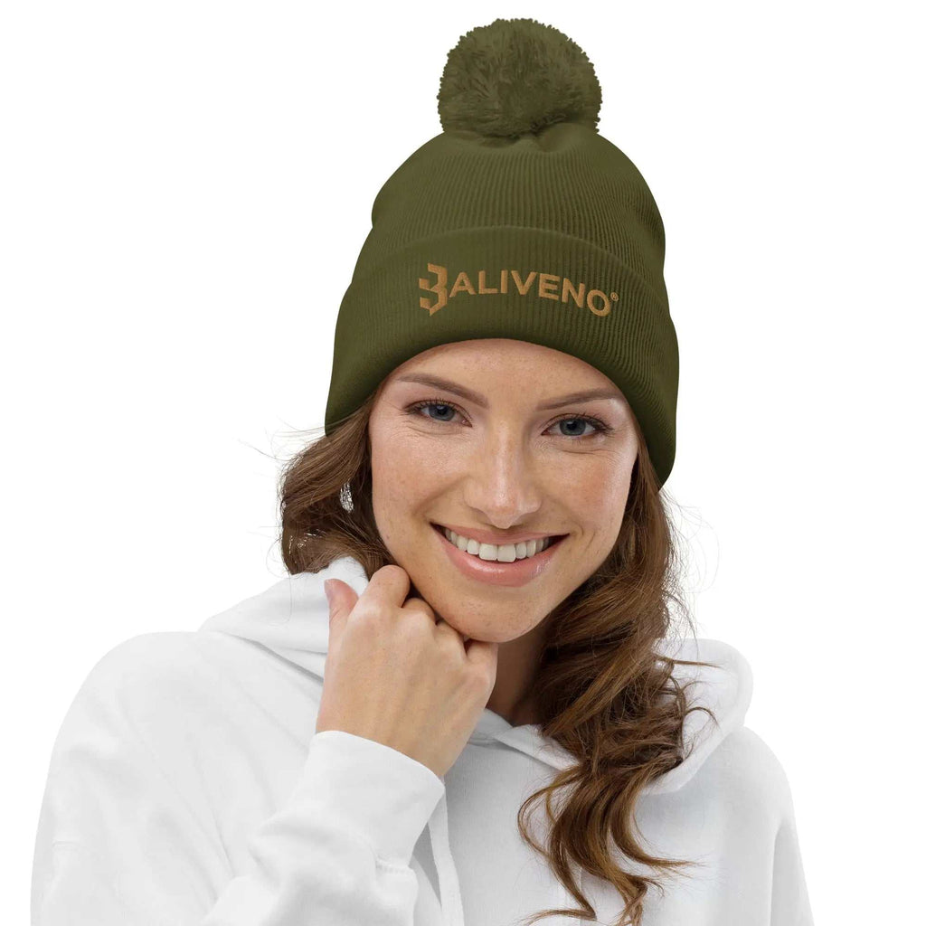 Baliveno Pom PomBaliveno Pom pom beanieStay cozy and stylish through chilly autumn days and winter's embrace with the Baliveno Pom Pom Beanie. Crafted from 100% soft-touch acrylic, this beanie promises bo[Bal]