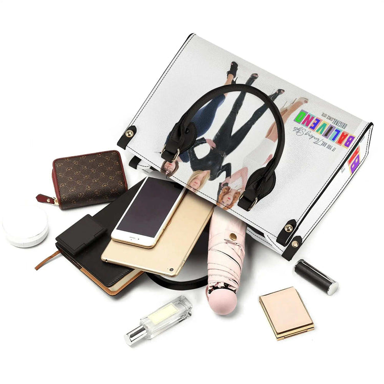 Baliveno Luxury leather HandbagBaliveno Luxury leather HandbagCrafted with quality vegan PU leather, this printed tote boasts a structured silhouette with dual top handles for a balanced, hands-free carry. A top zipper closure [Bal]
