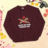 Love To StirLove To Stir Things Up SweatshirtEmbrace your unique style with our Love To Stir Things Up Sweatshirt, a sturdy and warm essential designed to keep you cozy during the colder months. Crafted with ca[Bal]