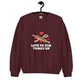 Love To StirLove To Stir Things Up SweatshirtEmbrace your unique style with our Love To Stir Things Up Sweatshirt, a sturdy and warm essential designed to keep you cozy during the colder months. Crafted with ca[Bal]