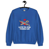 Love To StirLove To Stir Things Up SweatshirtEmbrace your unique style with our Love To Stir Things Up Sweatshirt, a sturdy and warm essential designed to keep you cozy during the colder months. Crafted with ca[Bal]