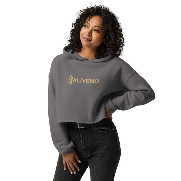 Baliveno Crop HoodieBaliveno Crop HoodieMake a stylish statement in this trend-setting Baliveno Cropped Raw Hem Drawstring Hoodie. This modern take on the classic pullover features an edgy raw hem and adju[Bal]